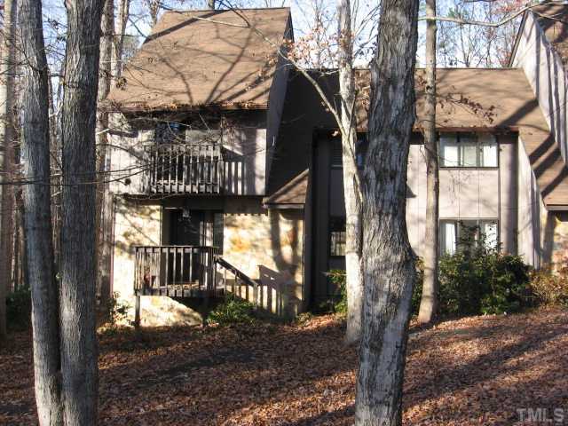 3060 A Colony Road Durham, NC 27705 - Photo 3 of 3 a view of a house with a yard and wooden fence
