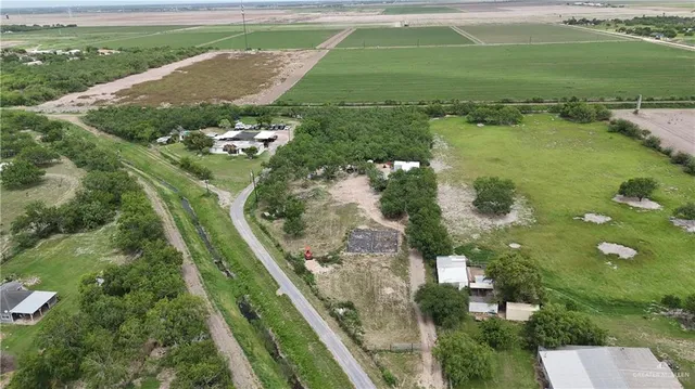 an aerial view of a houses with outdoor space