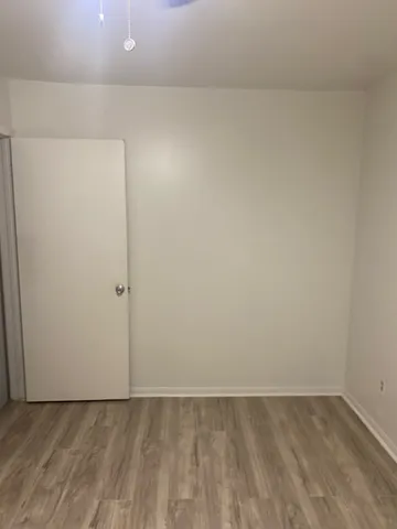 a view of a house with a backyard and porch