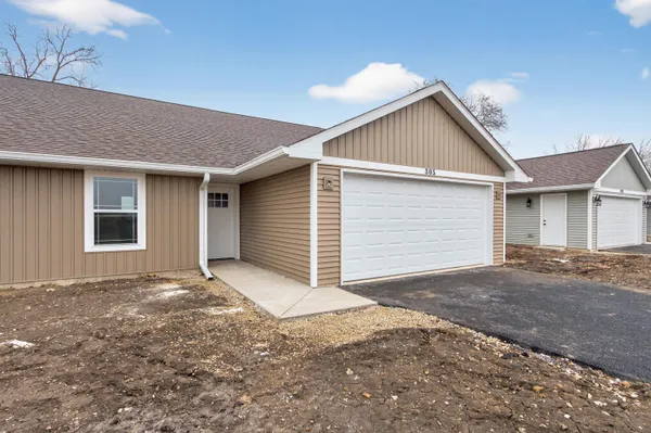 a view of house with garage