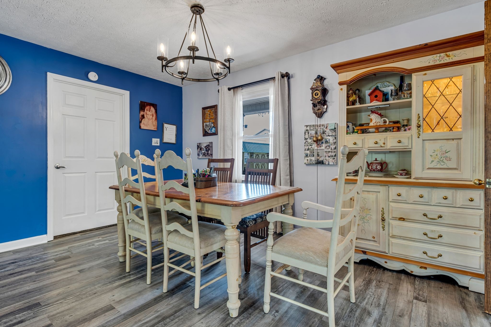 3526 Horn Springs Road Lebanon, TN 37087 - Photo 9 of 41 a view of a dining room with furniture window and wooden floor