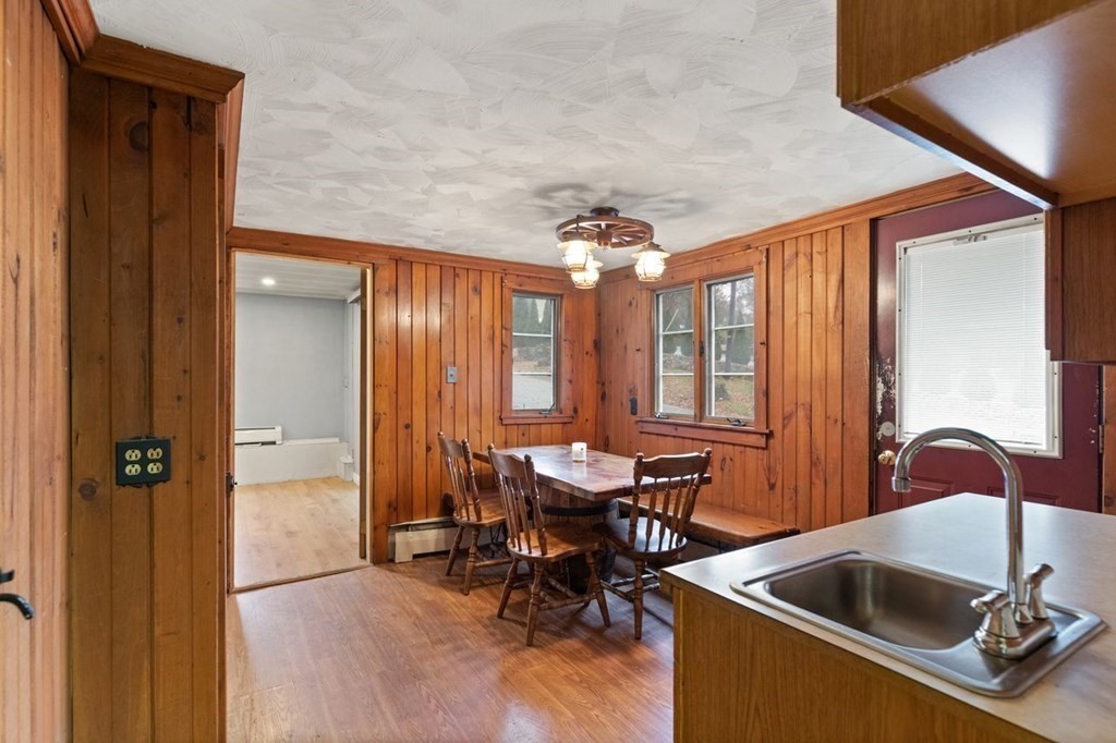 119 River Street Middleton, MA 01949 - Photo 11 of 31 a dining room with furniture and window