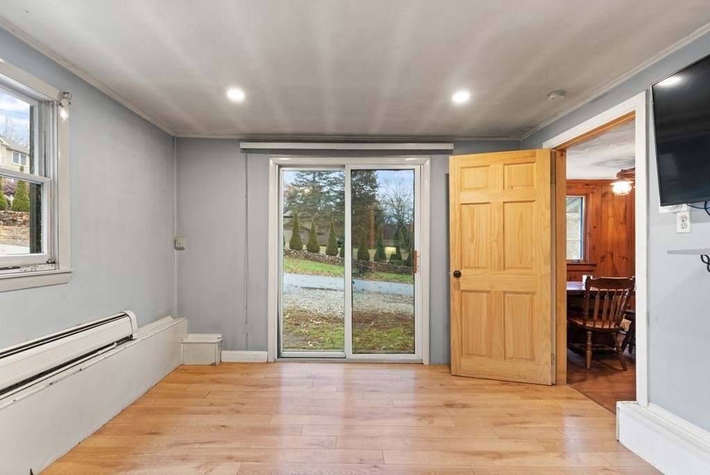 119 River Street Middleton, MA 01949 - Photo 21 of 31 a view of an empty room with a window
