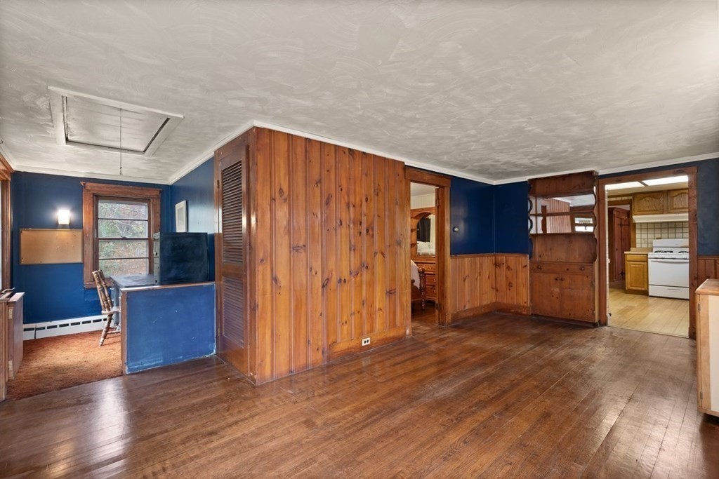 119 River Street Middleton, MA 01949 - Photo 8 of 31 a view of livingroom with furniture and wooden floor