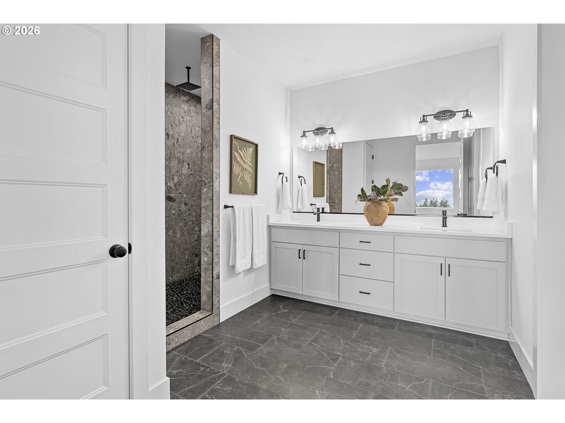 19350 Northeast Trunk Road Dundee, OR 97115 - Photo 14 of 14 a bathroom with a double vanity sink a mirror and shower