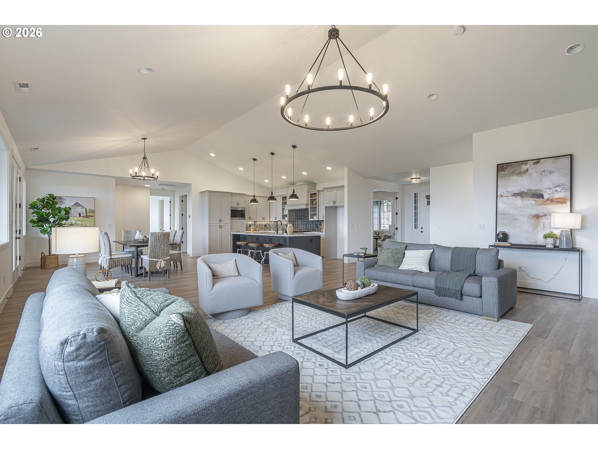19350 Northeast Trunk Road Dundee, OR 97115 - Photo 6 of 14 a living room with furniture kitchen and a chandelier