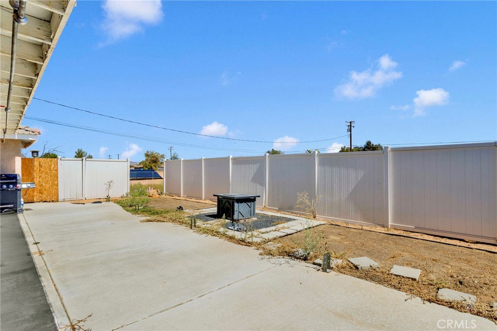 13597 Kiowa Road Apple Valley, CA 92308 - Photo 11 of 44 a view of a sink and a yard