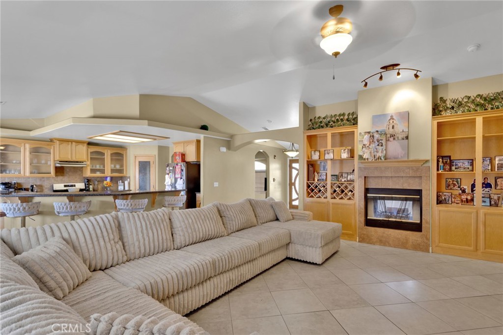 13597 Kiowa Road Apple Valley, CA 92308 - Photo 12 of 44 a view of a livingroom with furniture and a fireplace