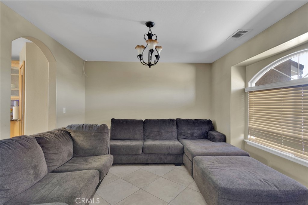 13597 Kiowa Road Apple Valley, CA 92308 - Photo 15 of 44 a living room with furniture