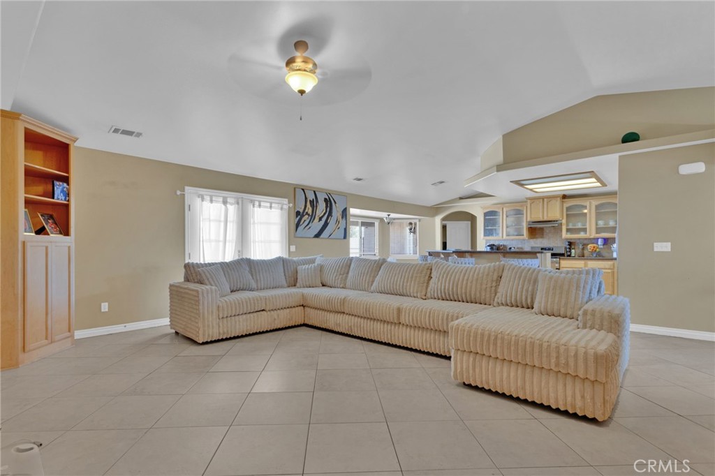 13597 Kiowa Road Apple Valley, CA 92308 - Photo 38 of 44 a living room with furniture and a couch