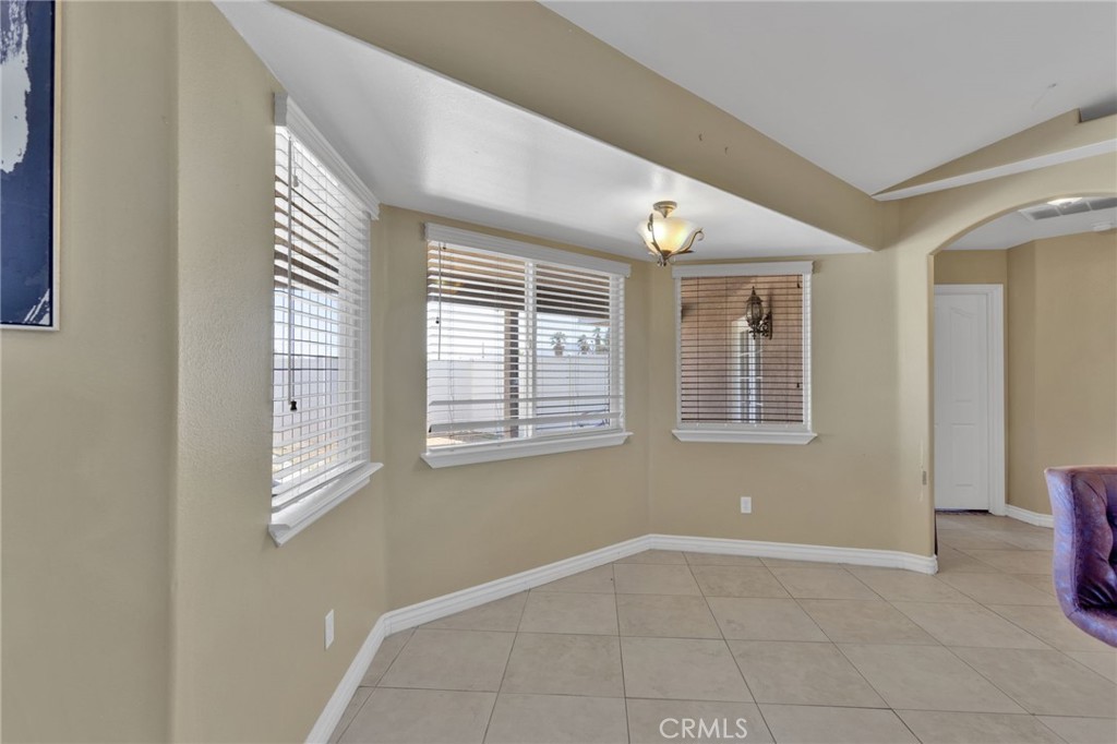 13597 Kiowa Road Apple Valley, CA 92308 - Photo 39 of 44 a view of an empty room with a window