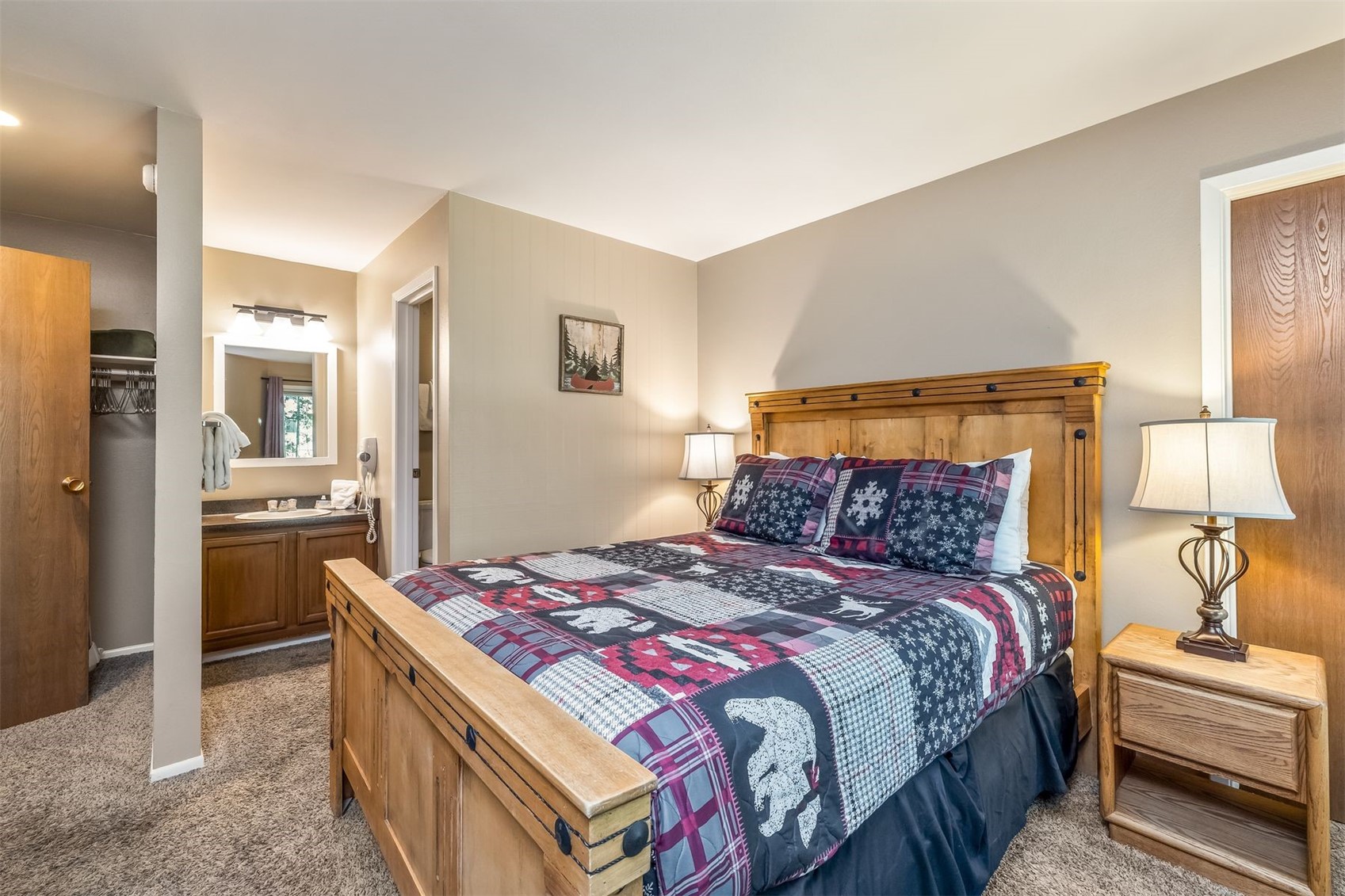 1977 Soda Ridge Road, Unit 1194 Keystone, CO 80435 - Photo 17 of 38 a bedroom with a bed and a lamp