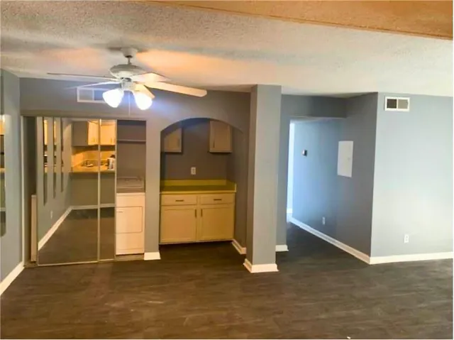 a view of a livingroom with a flat screen tv