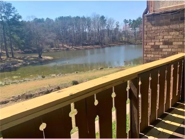 a view of a lake from a balcony