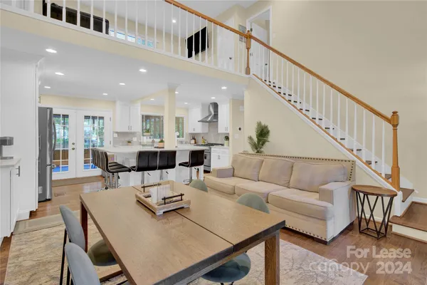 a dining room with furniture and a dining table