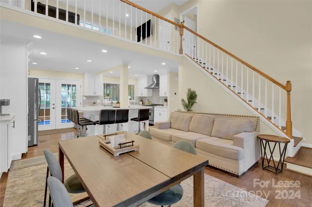 a dining room with furniture and a dining table
