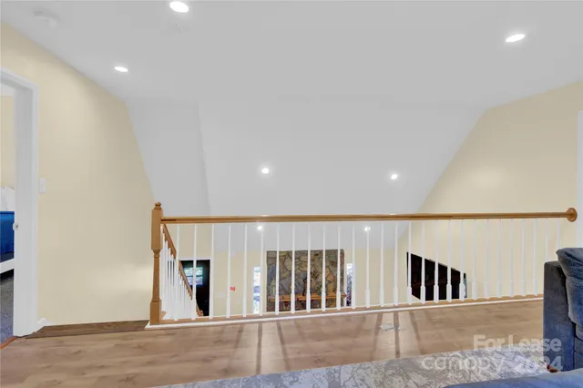 a view of a hallway with an entryway