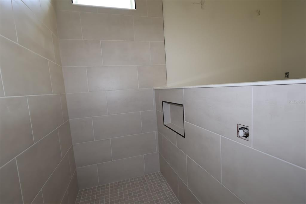 5113 Chapel Row Avenue Apollo Beach, FL 33572 - Photo 12 of 19 a bathroom with a shower
