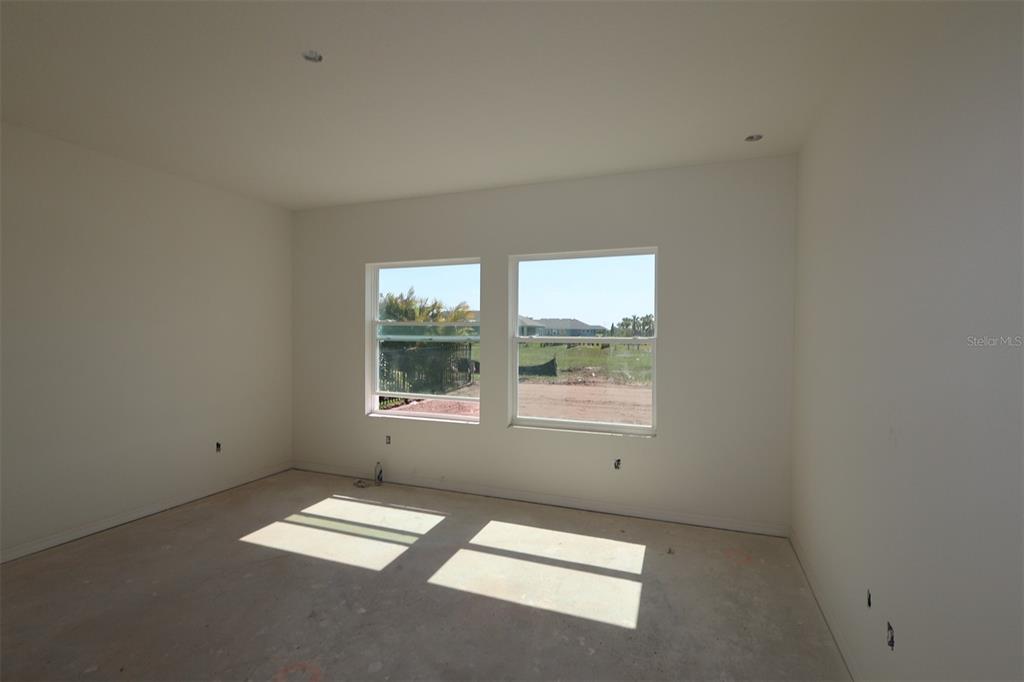 5113 Chapel Row Avenue Apollo Beach, FL 33572 - Photo 10 of 19 an empty room with a window