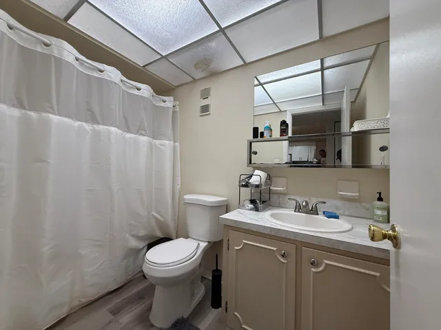 a view of a swimming pool with a lounge chairs