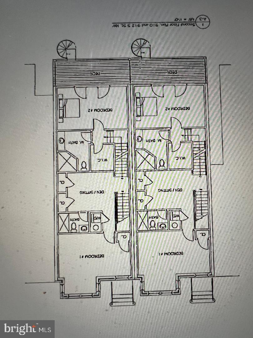 912 S Street Northwest, Unit 1 Washington, DC 20001 - Photo 29 of 29 a wall with a white comforter and a painting on the wall