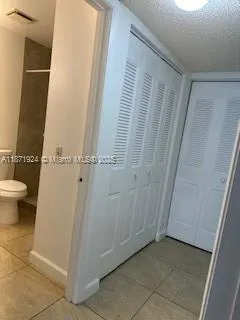 a view of bathroom with a sink and toilet