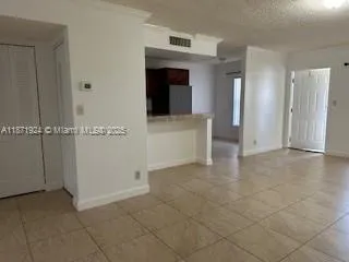 a view of a livingroom with an empty space