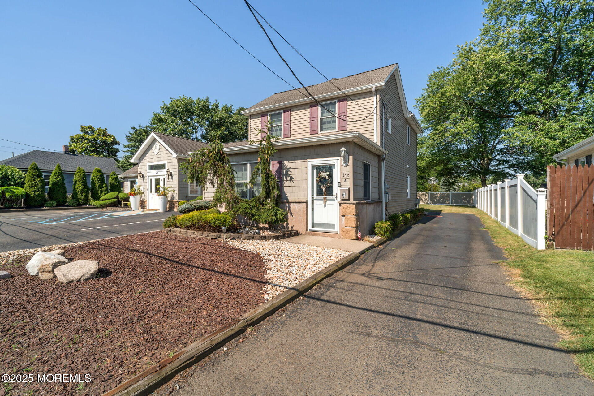 362 Broadway Keyport, NJ 07735 - Photo 15 of 18 a front view of a house with garden