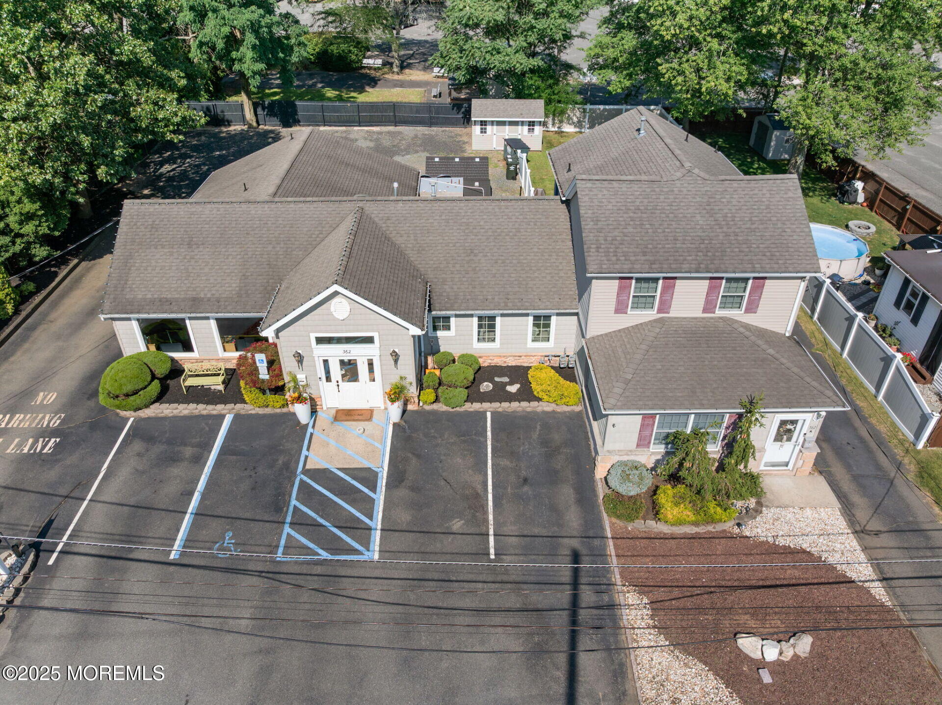 362 Broadway Keyport, NJ 07735 - Photo 2 of 18 an aerial view of a house with swimming pool and glass windows