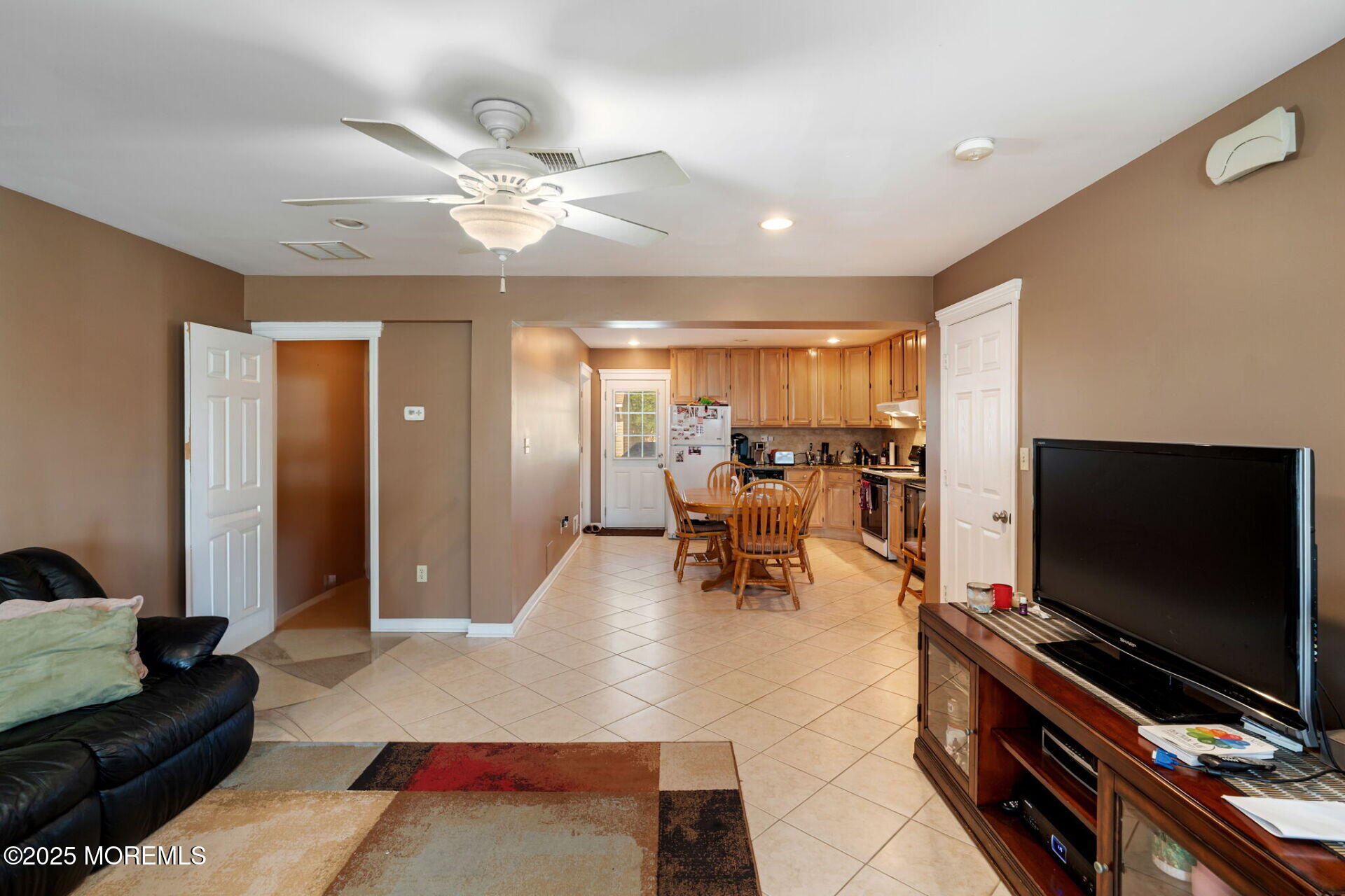 362 Broadway Keyport, NJ 07735 - Photo 5 of 18 a living room with furniture and a flat screen tv