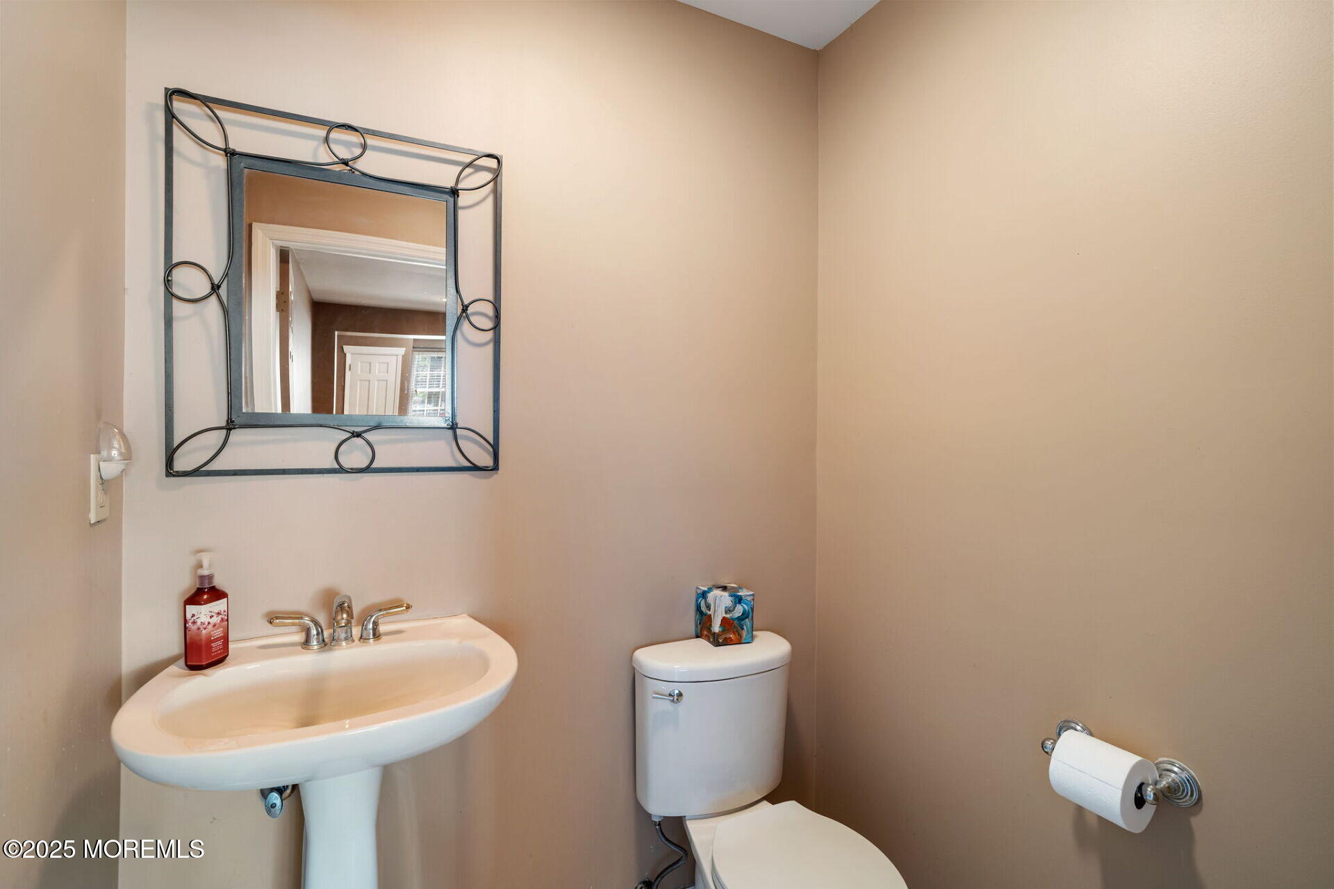 362 Broadway Keyport, NJ 07735 - Photo 10 of 18 a bathroom with a toilet sink and mirror