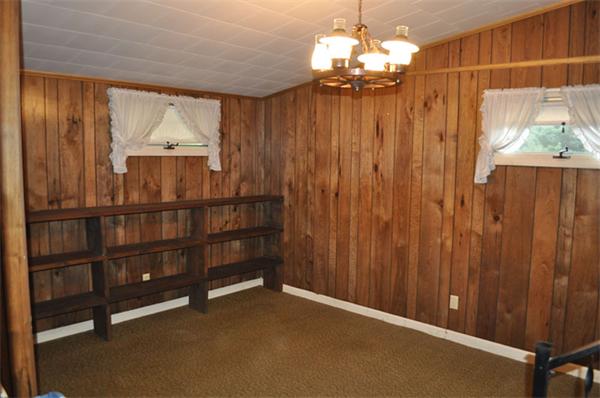 351 Ware Corner Road Oakham, MA 01068 - Photo 21 of 30 a view of a room with window and chandelier fan