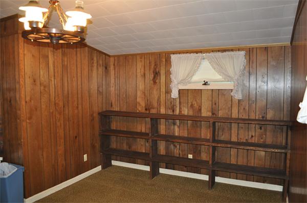 351 Ware Corner Road Oakham, MA 01068 - Photo 23 of 30 a view of a room with racks on the wall and a window