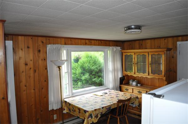 351 Ware Corner Road Oakham, MA 01068 - Photo 6 of 30 a view of a dining room with furniture window and outside view