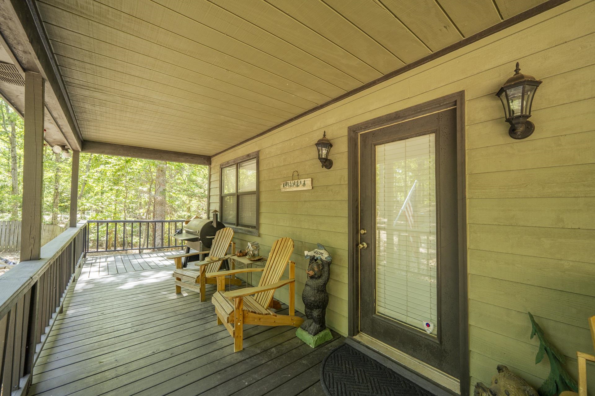 435 Murray Lane Counce, TN 38326 - Photo 5 of 34 Covered porch featuring wood-finish siding and decking