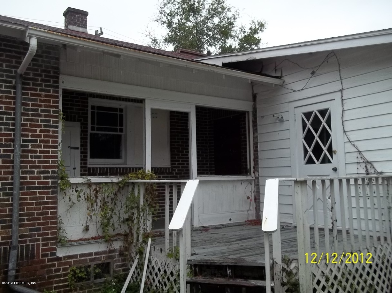 3038 Post Street Jacksonville, FL 32205 - Photo 3 of 13 a front view of a house with a garage