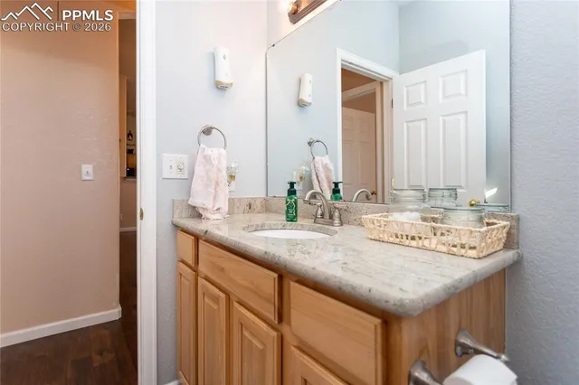 a room with furniture and gym equipment