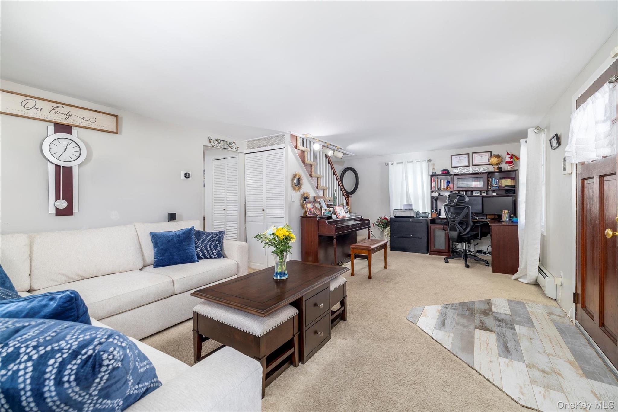 982 Adams Street Baldwin, NY 11510 - Photo 7 of 28 a living room with furniture and a flat screen tv