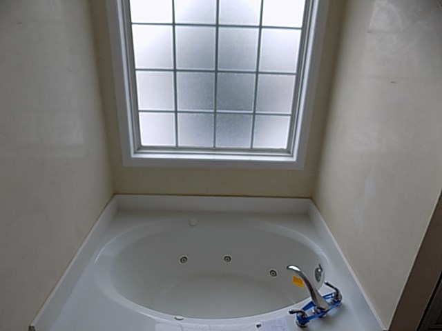 443 Annies Path Gray, GA 31032 - Photo 14 of 23 an empty room with a window