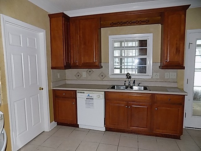 443 Annies Path Gray, GA 31032 - Photo 9 of 23 a kitchen with a sink and cabinets