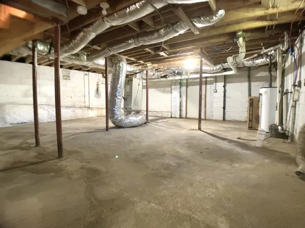 a view of a room with wooden walls