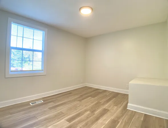 an empty room with a window