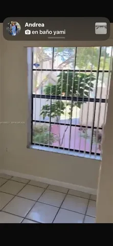 a view of a window with an outdoor space