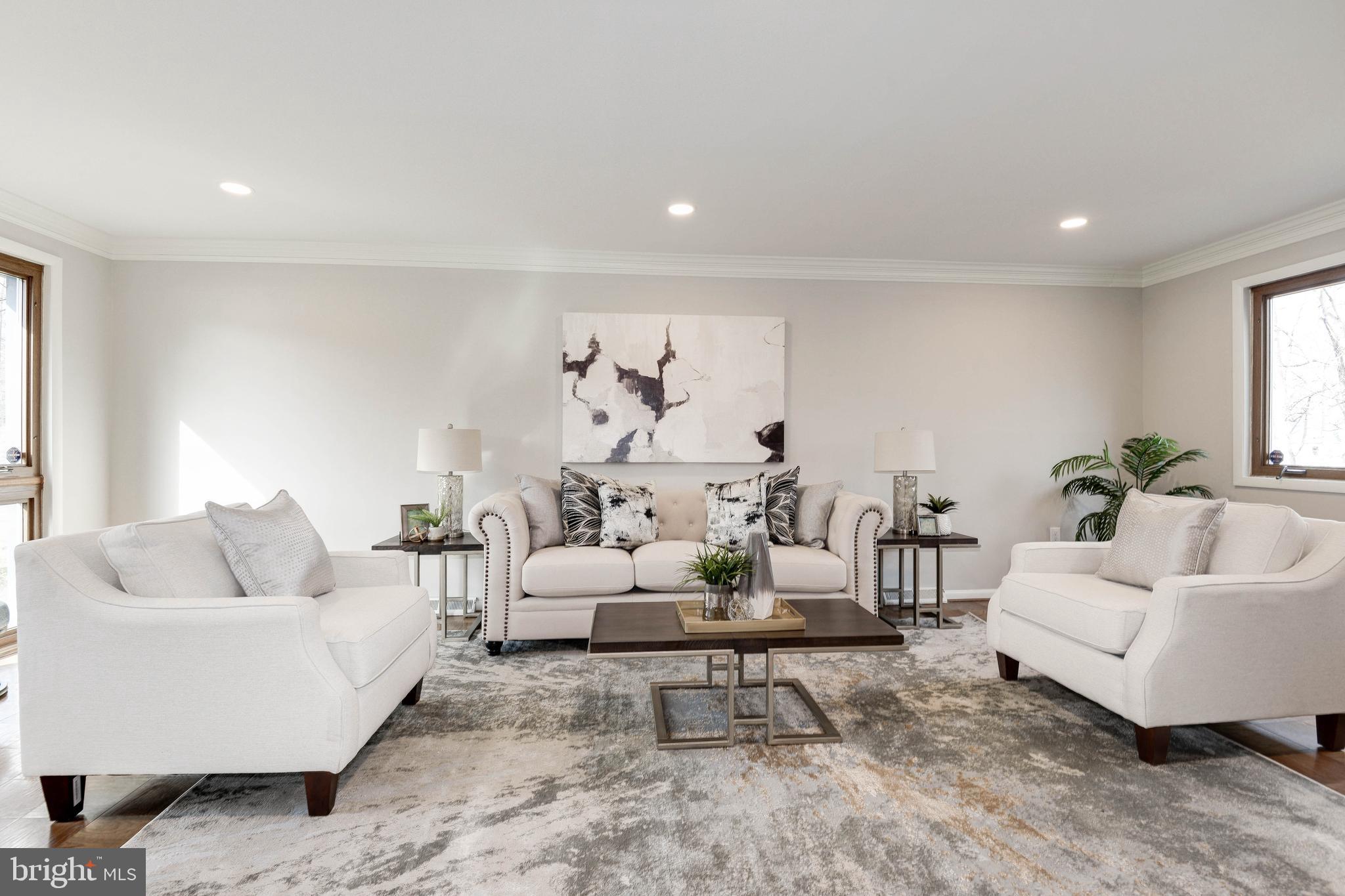 11805 Blue Spruce Road Reston, VA 20191 - Photo 14 of 74 a living room with furniture and white walls