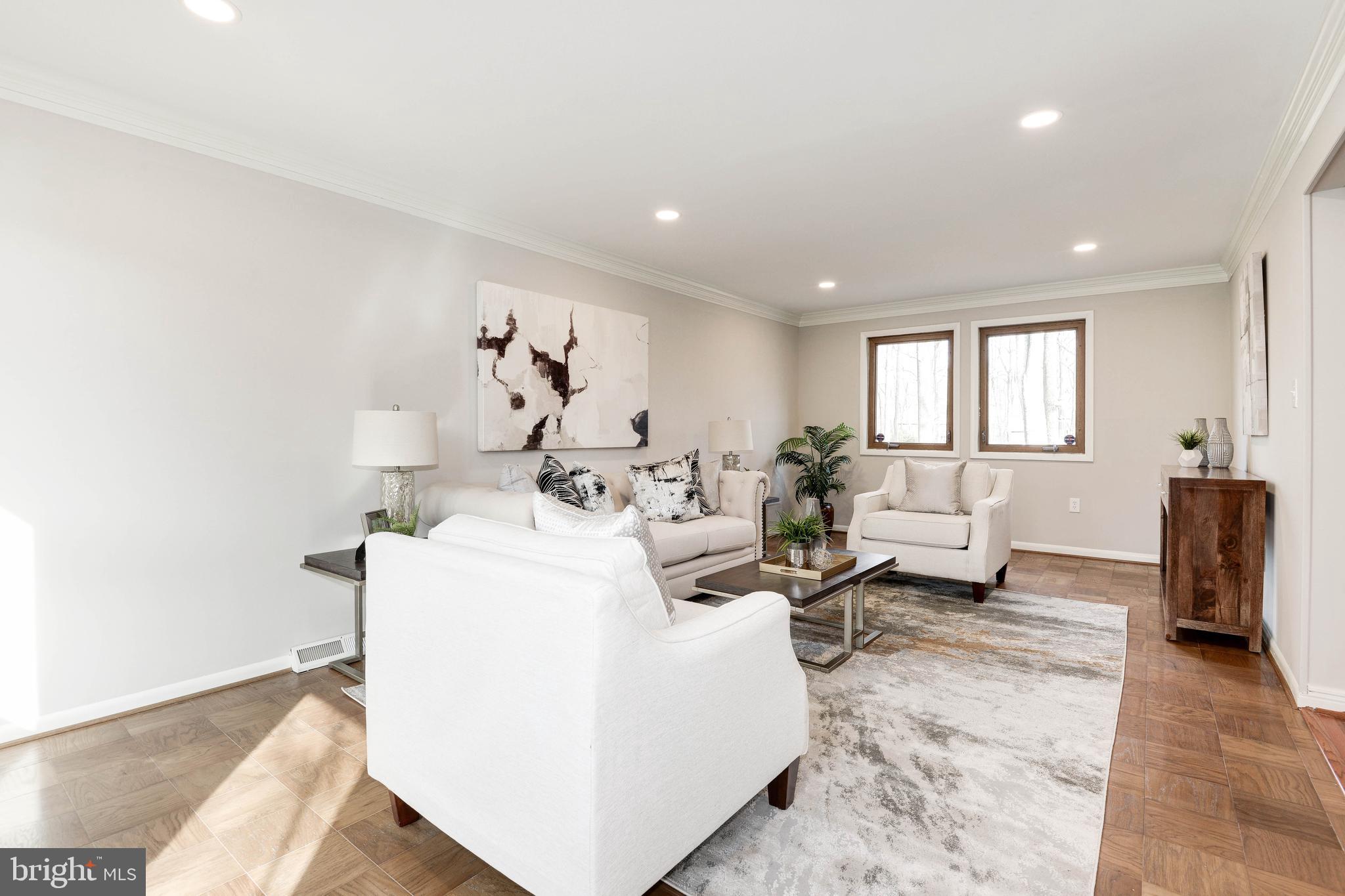 11805 Blue Spruce Road Reston, VA 20191 - Photo 16 of 74 a living room with furniture and a window