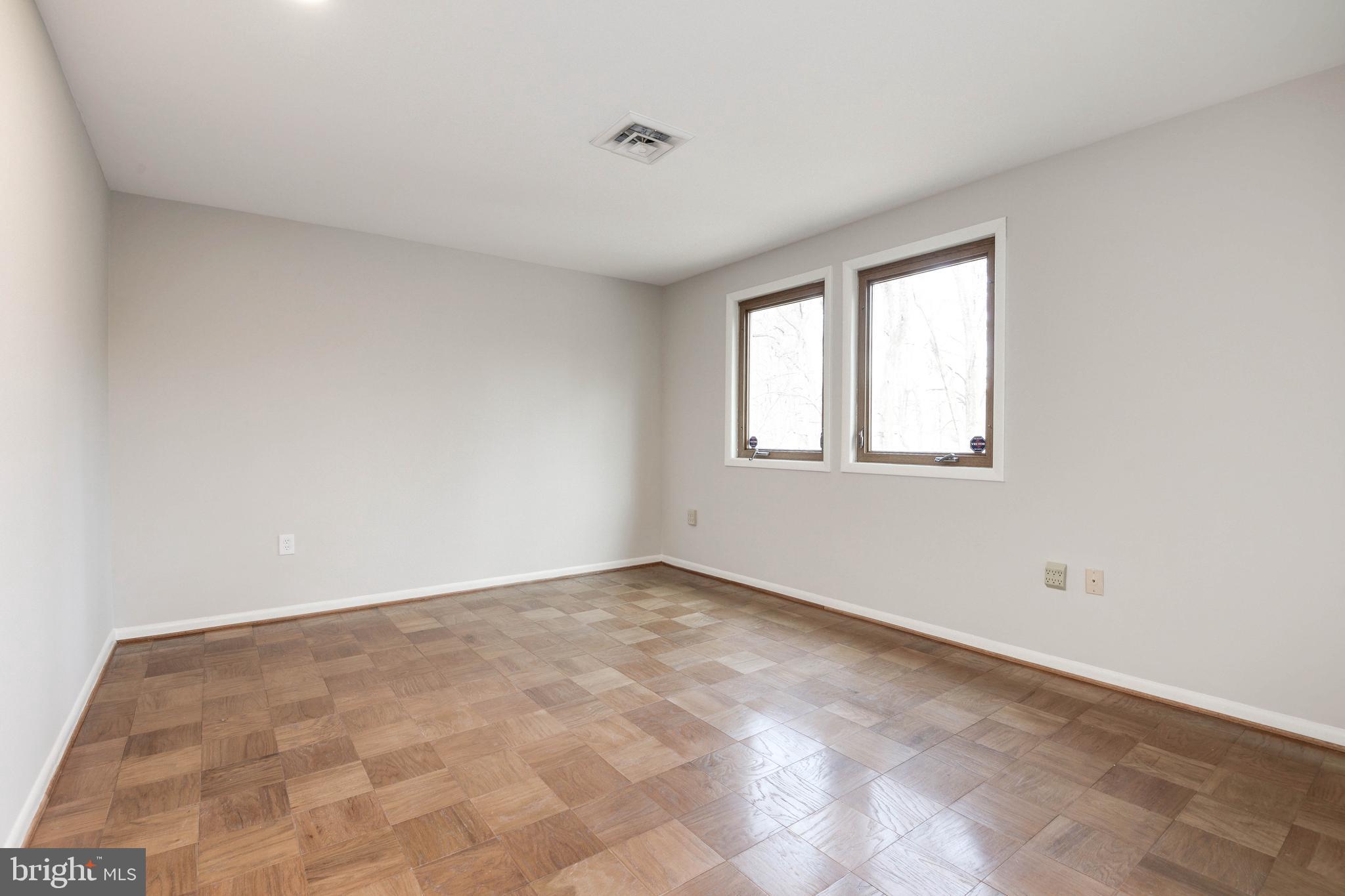 11805 Blue Spruce Road Reston, VA 20191 - Photo 52 of 74 a view of an empty room with a window