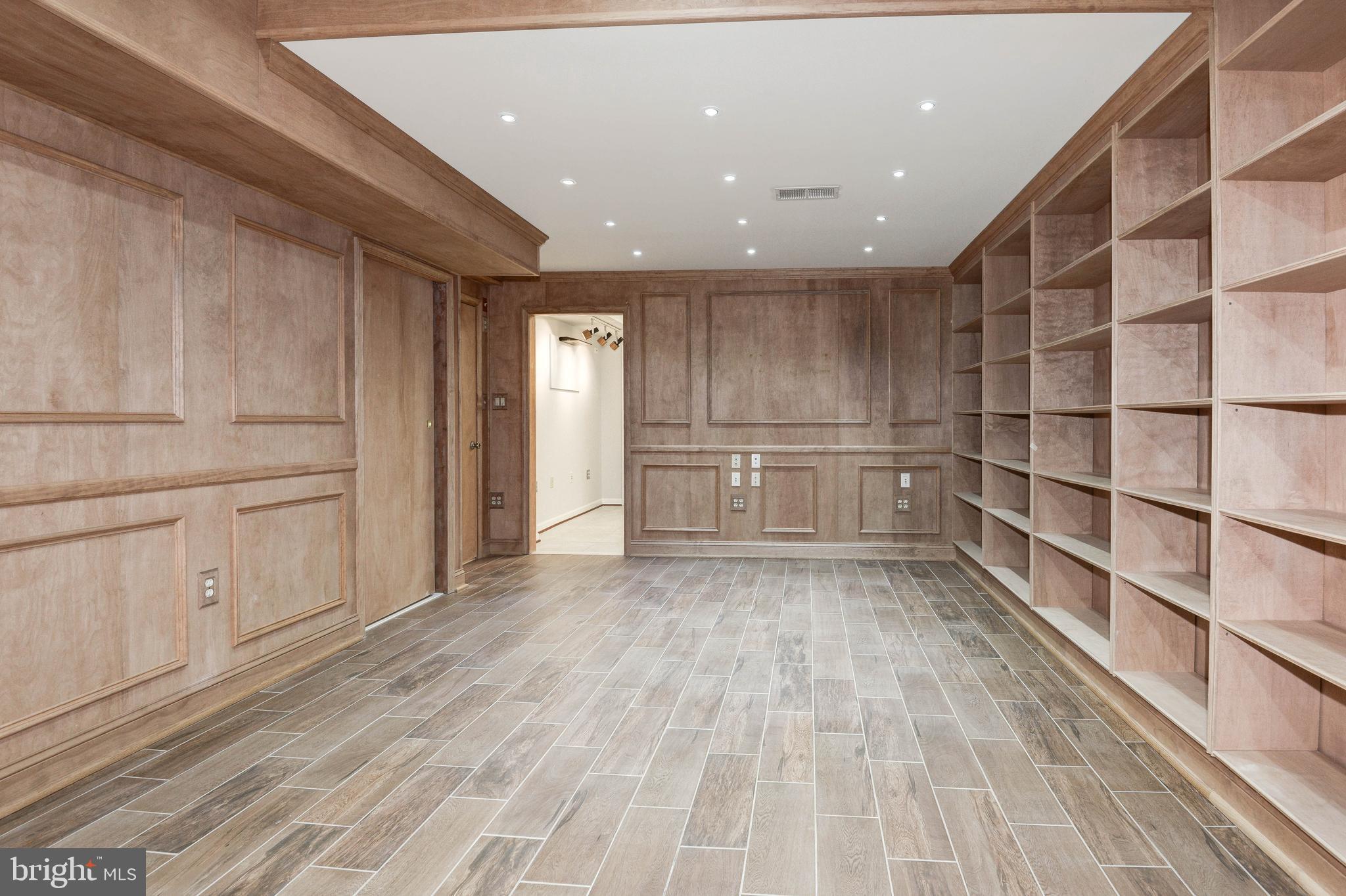 11805 Blue Spruce Road Reston, VA 20191 - Photo 60 of 74 a view of kitchen with white wooden cabinets and refrigerator