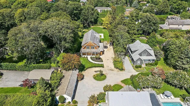 an aerial view of a house with outdoor space