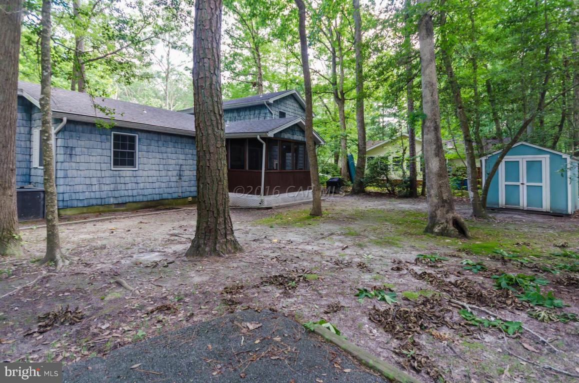 13 Capetown Road Ocean Pines, MD 21811 - Photo 25 of 46 a view of a house with yard and tree s