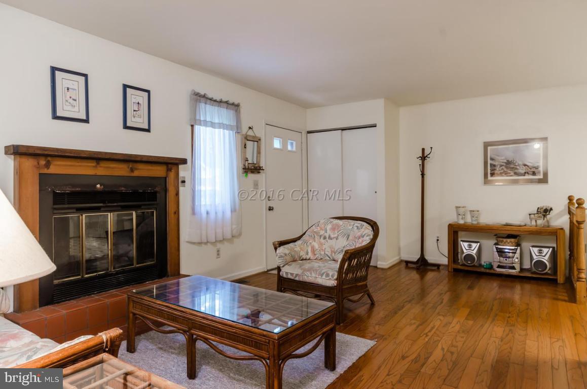 13 Capetown Road Ocean Pines, MD 21811 - Photo 5 of 46 a living room with furniture and a wooden floor
